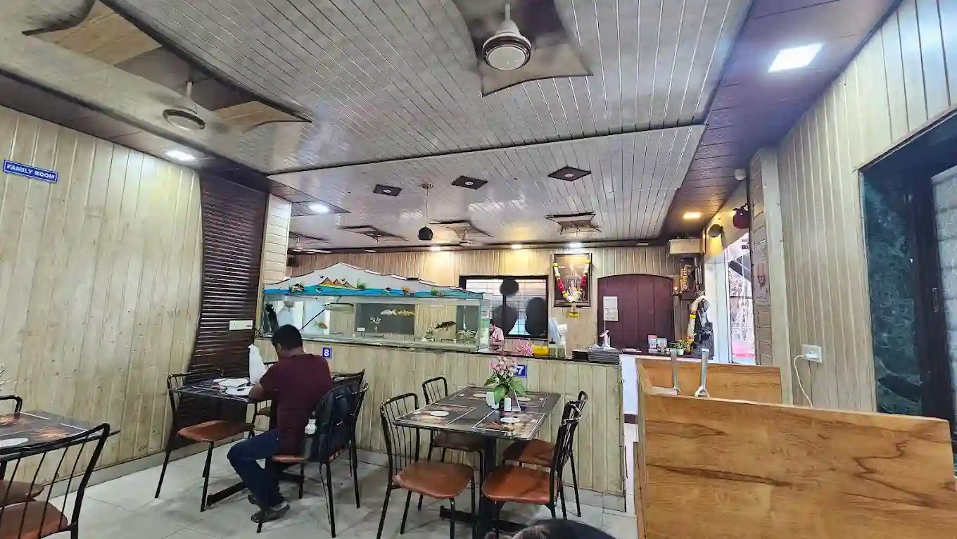 Comfortable seating area at Sawali Pure Veg, the best hotel in Dighi Pune